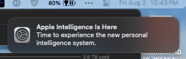 Notification stating, “Apple Intelligence Is Here” with the message, “Time to experience the new personal intelligence system.” The time is 10:43 PM on Friday, August 2, and the battery is at 80%.